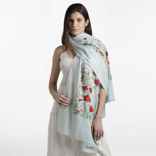 Model wearing handwoven cashmere, Poppy Ivory Butidar Radial Dye Shawl