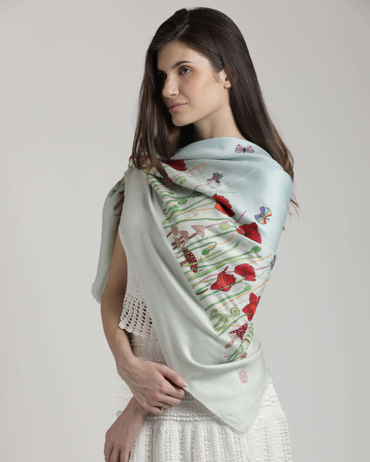 Model wearing handwoven cashmere, Poppy Ivory Psychedelic Bugs Radial Dye Carre